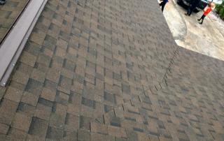 finished roof with brown shingles